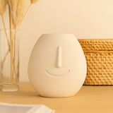 Artisan Ivory Face Vase – Sculptural Ceramic Accent